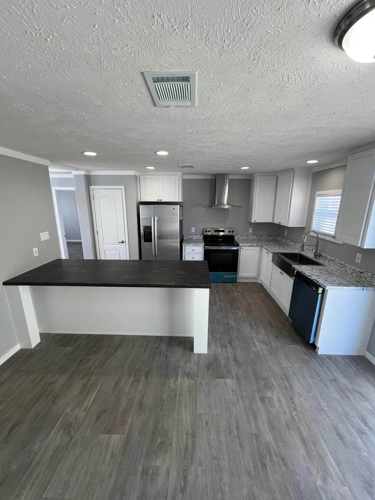 Multi-section homes kitchen home features